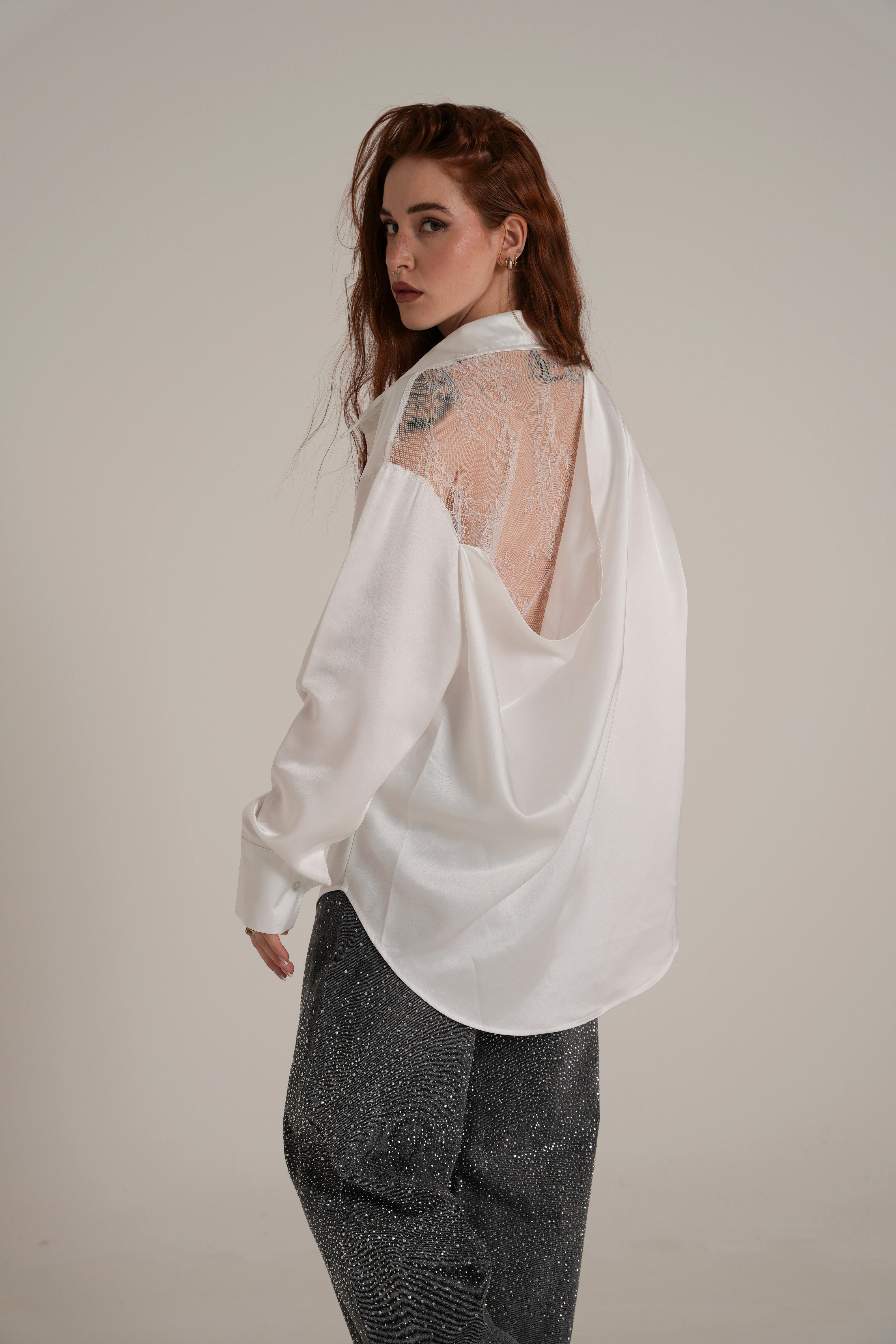 Blusa con pizzo