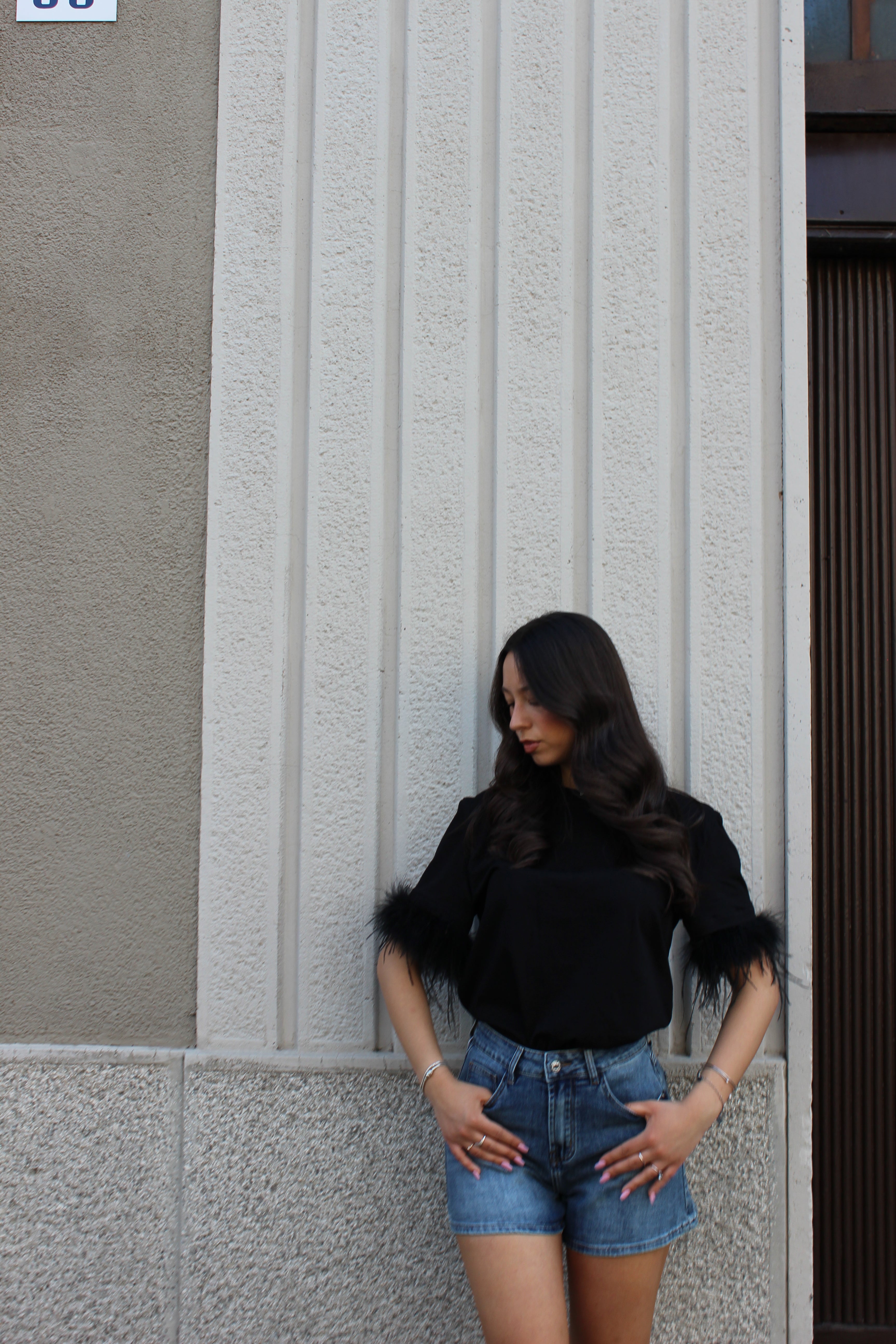 Maglia Lumina nera con piume
