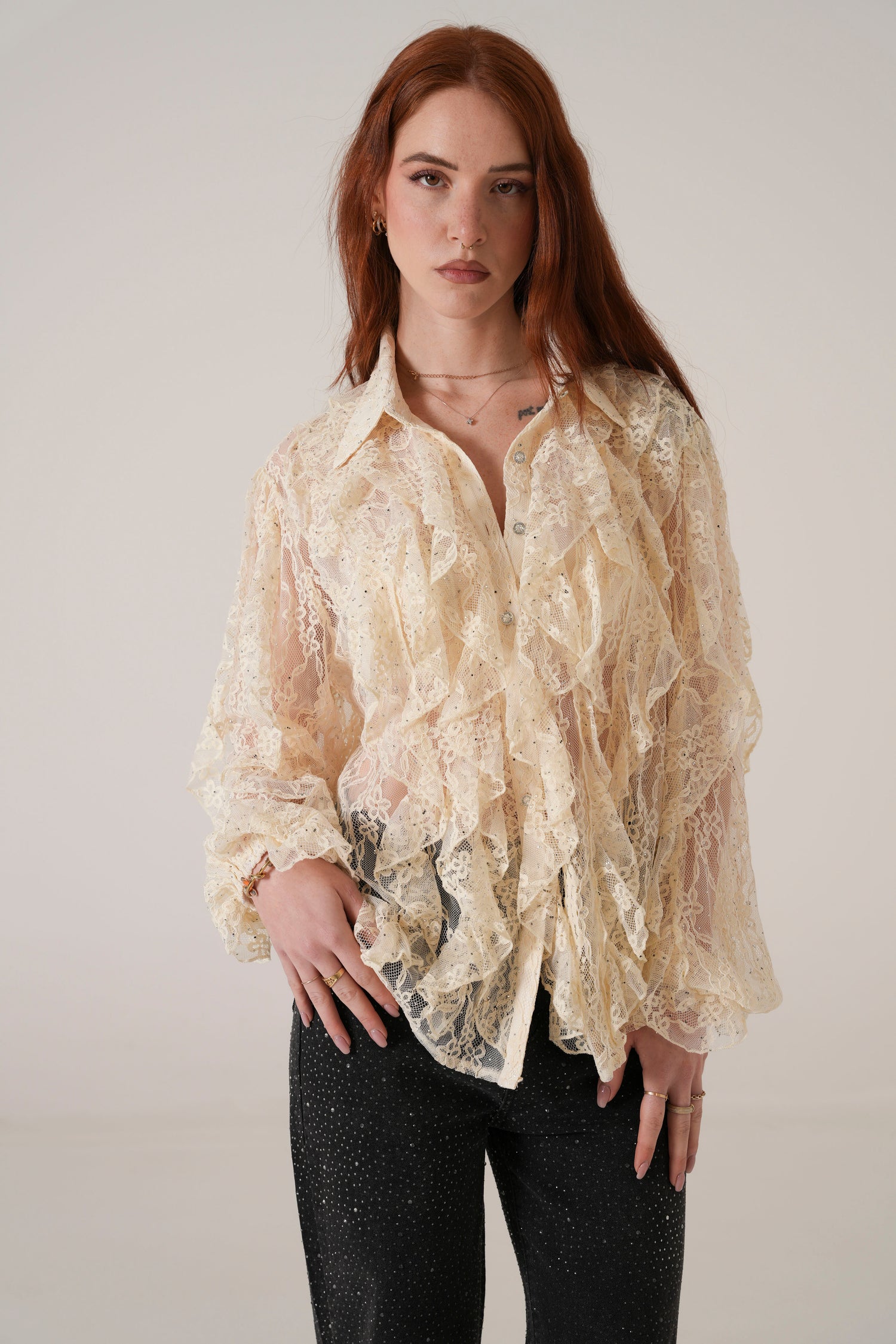 Blusa in pizzo con microstrass