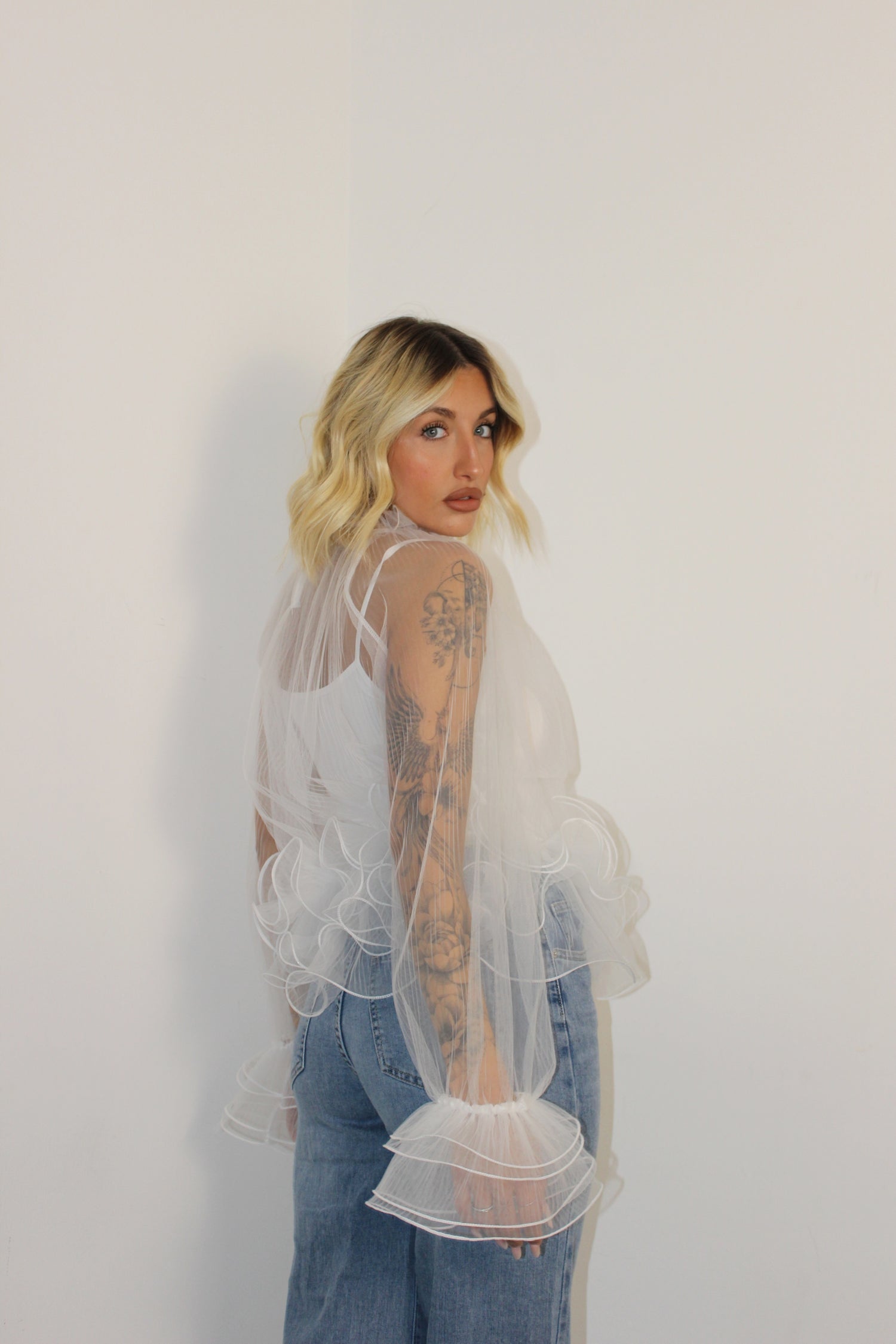 Blusa con volant Bianca