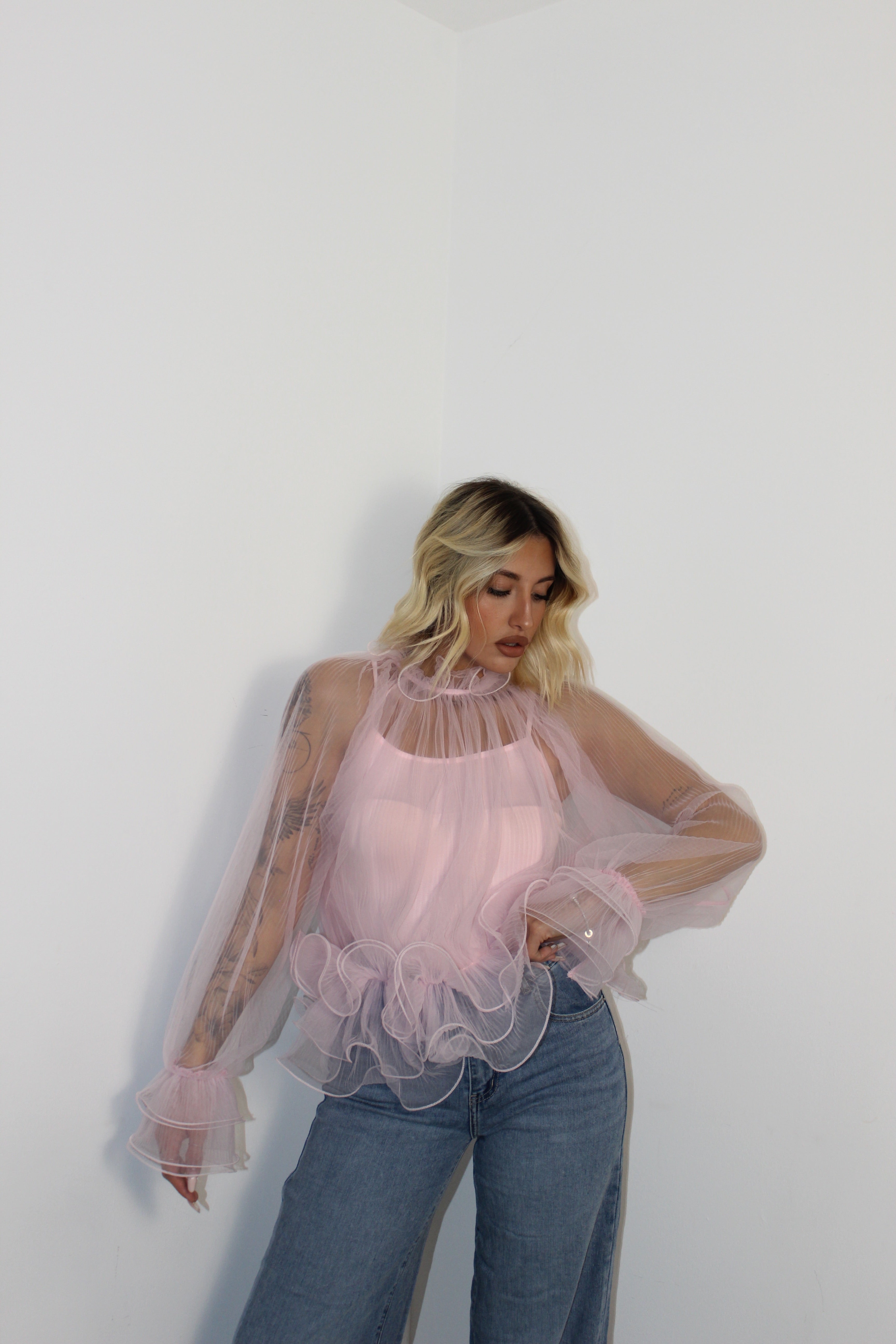 Blusa con volant Rosa
