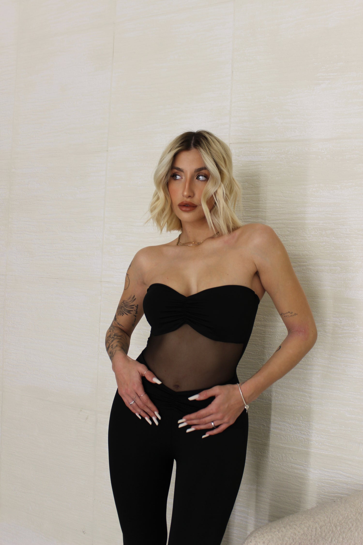 Jumpsuit con fascia trasparente