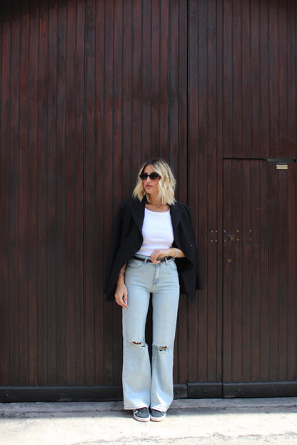 Jeans wide leg con strappo