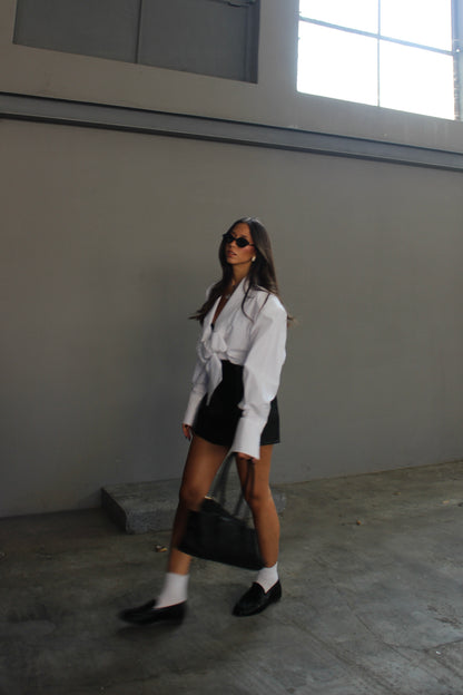 Blusa con fiocco