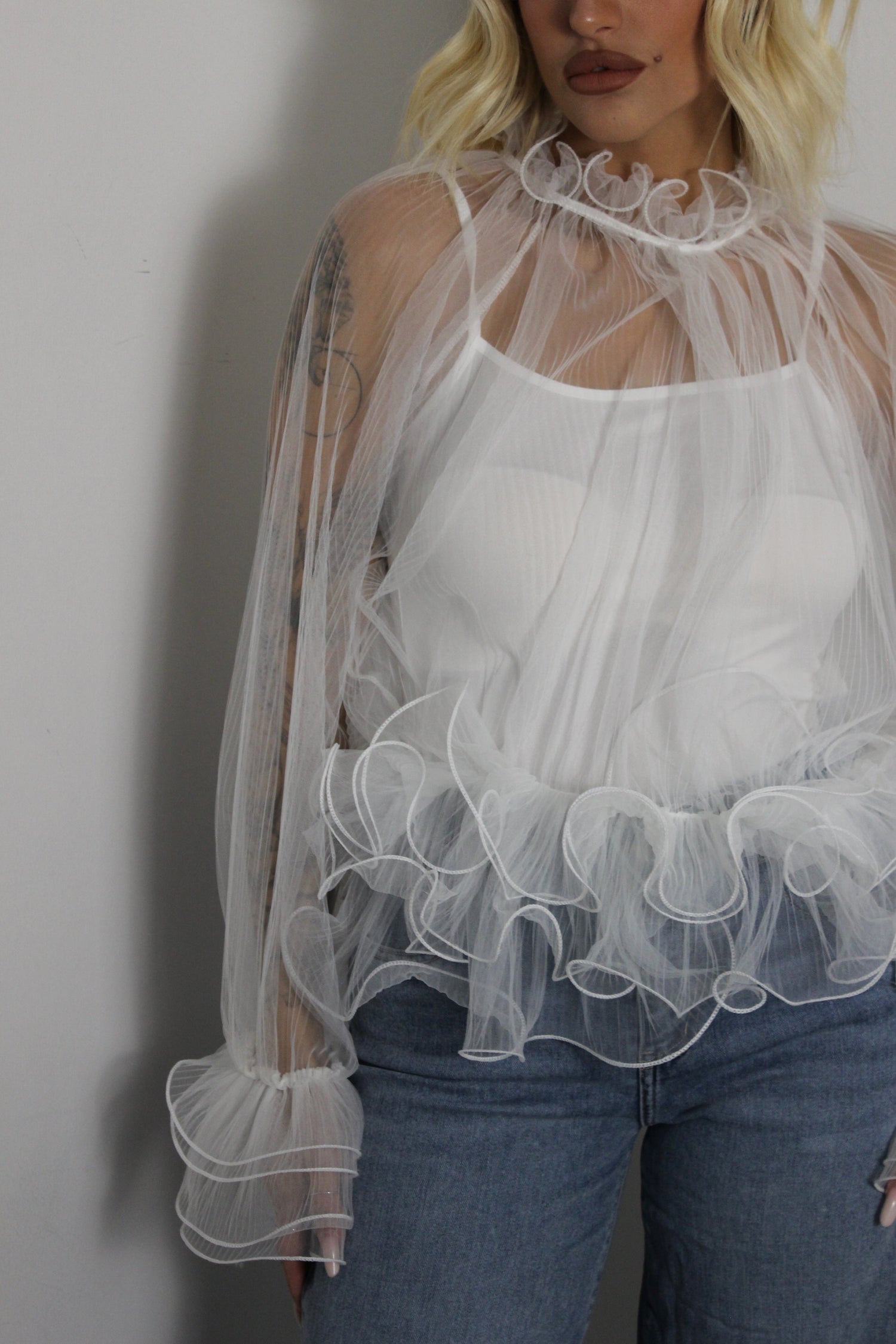 Blusa con volant Bianca