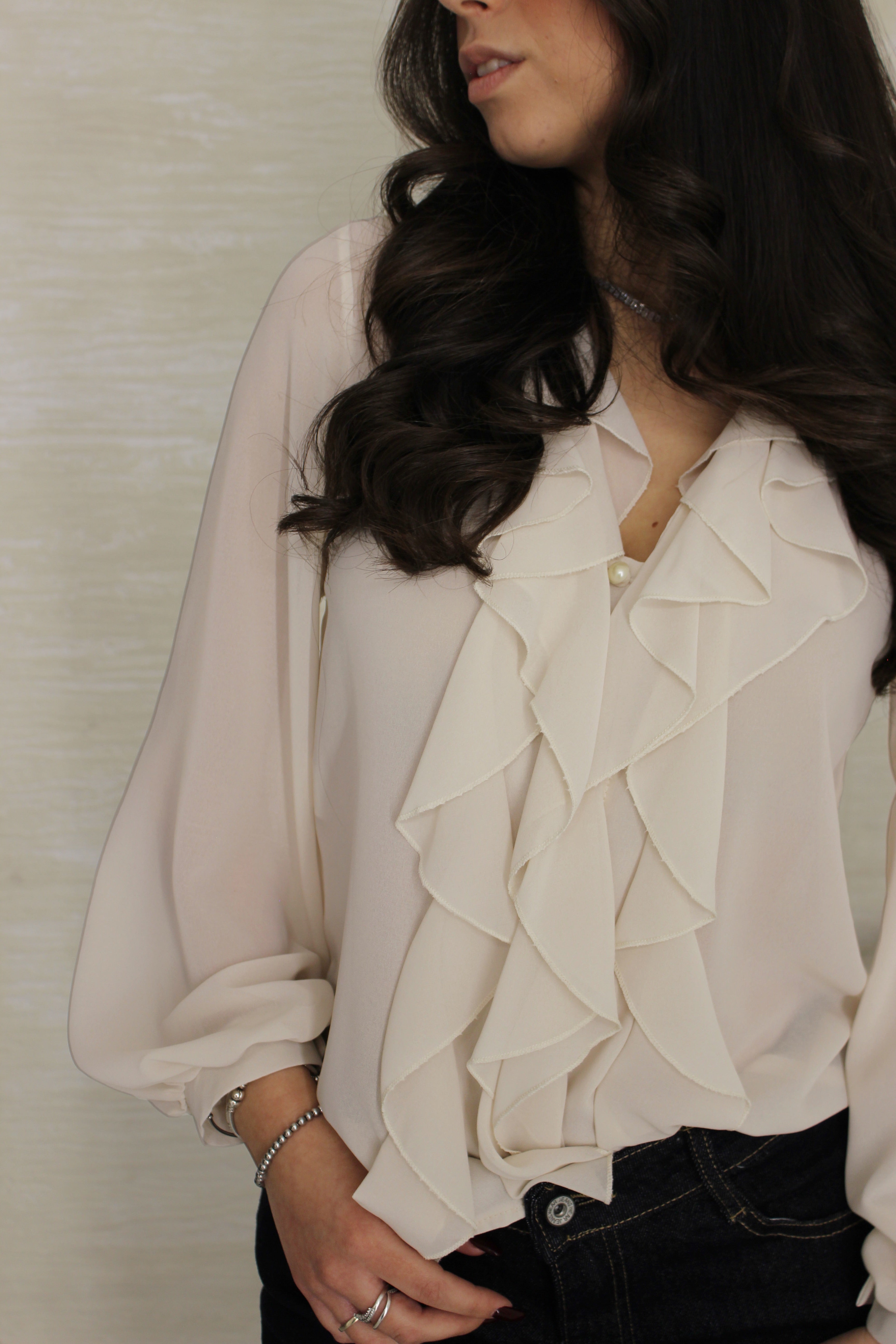 Blusa con rouge crema