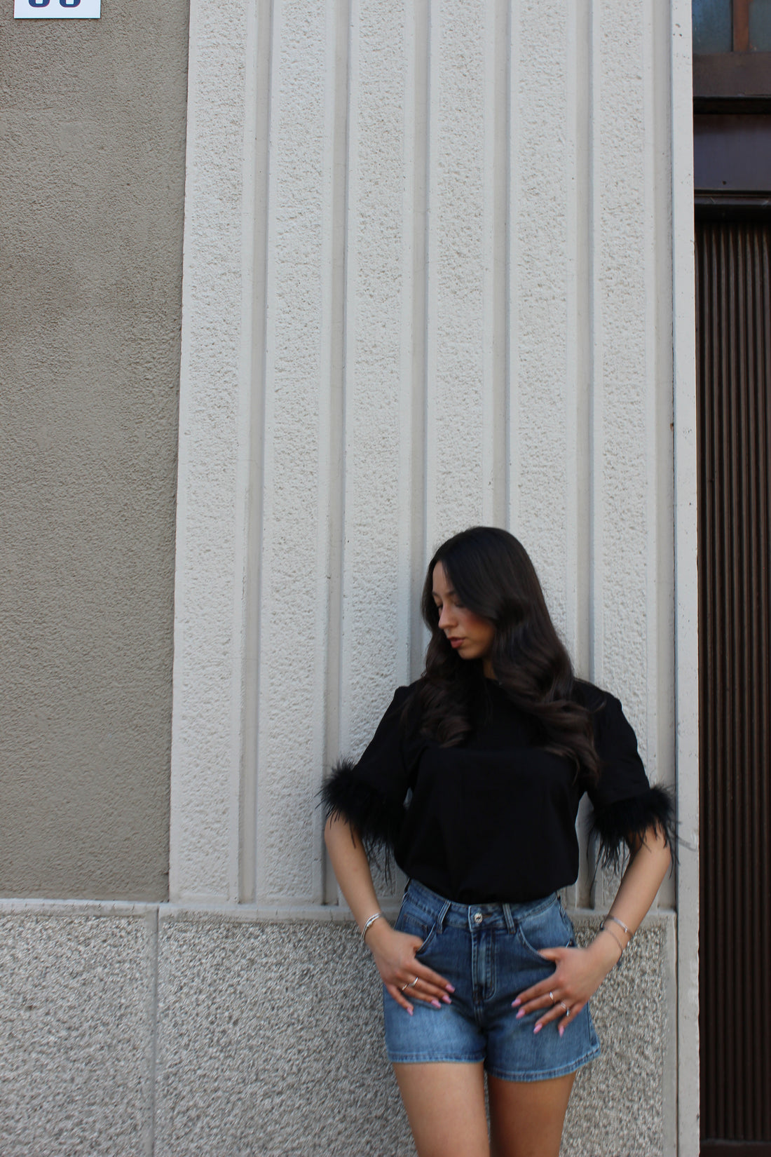 Maglia Lumina nera con piume