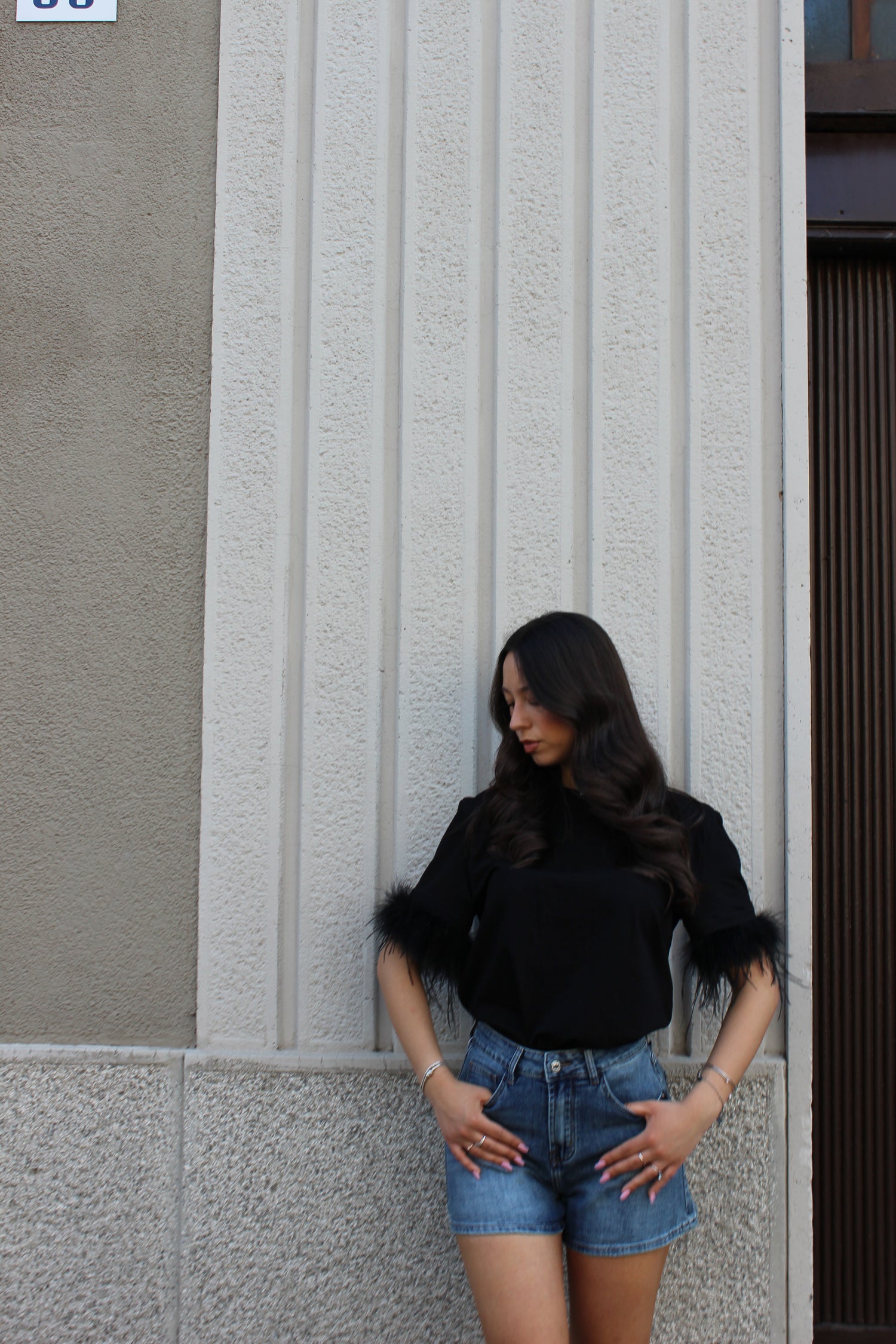 Maglia Lumina nera con piume